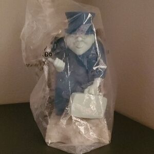Blue Figurine with Briefcase